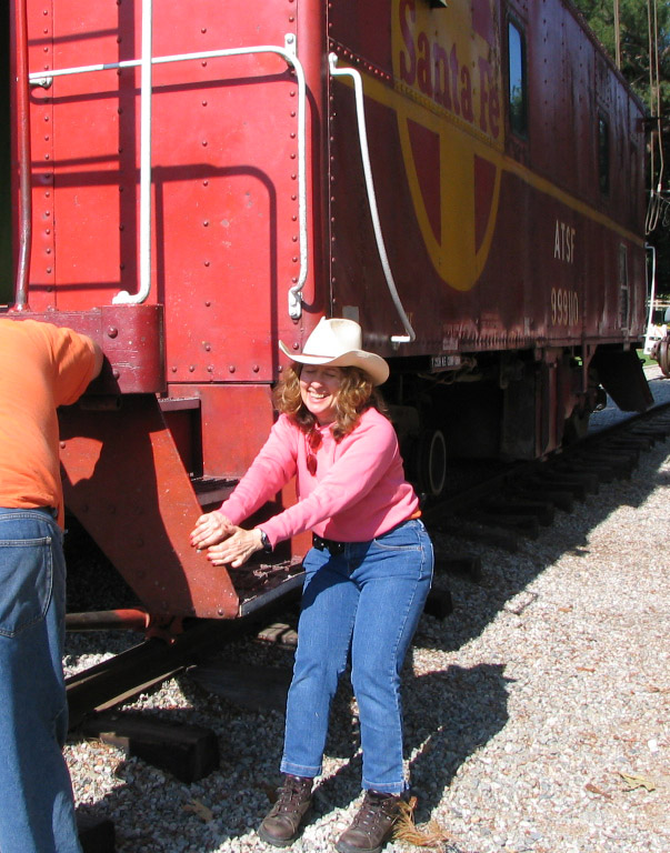DC's caboose lends a hand to move a real caboose