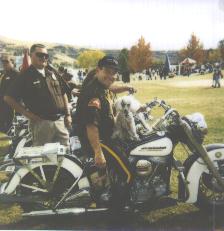 Doggie rides on his Trick-riding Daddy's Harley!